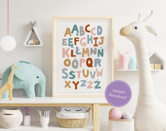 May include: A framed alphabet print with colorful letters in a child's room. The letters are in various colors, including teal, brown, and pink. The room also features a giraffe, elephant, and other decorative items.