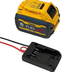 May include: A yellow and black DeWalt 6Ah FlexVolt battery with a black adapter and red and black wires. The battery is labelled "20V/60V".
