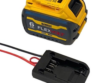 May include: A yellow and black DeWalt 6Ah FlexVolt battery with a black adapter and red and black wires. The battery is labeled "20V/60V".