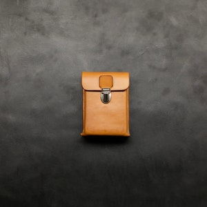 Instax mini film holder ,Tuscany leather , contains 20 instax mini films, three 35mm film rolls. entirely hand-stitched. Handmade in Italy