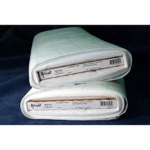 May include: Two rolls of white Bosal quilting batting. Each roll has a label that reads "Bosal" and "2" Quilt's Gold". The batting is pre-quilted with a grid pattern. The rolls are 45 inches wide and 25 yards long.