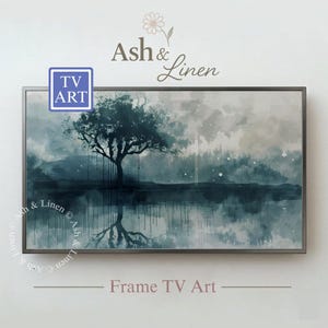 May include: A framed TV art piece featuring a watercolor landscape with a tree reflected in the water. The artwork is in shades of blue and gray, with the text "Ash & Linen" and "Frame TV Art". The TV art has a blue square with the text "TV ART".