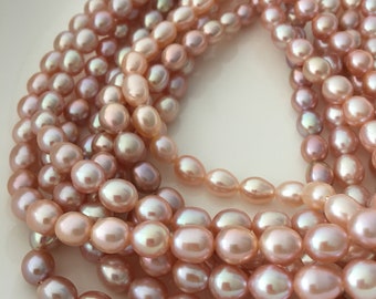 Pink rice pearl strand, 6.5-7.5mm natural color pink pearls, high luster freshwater pearl strand.