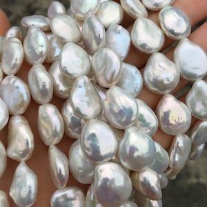 Metallic white coin pearl strand, high luster drop coin pearls.