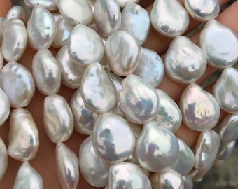 Metallic white coin pearl strand, high luster drop coin pearls.