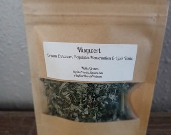 May include: A brown paper bag with a clear window showing dried mugwort herb. The bag has a label that reads "Mugwort Dream Enhancer, Regulates Menstruation & Liver Tonic Nola Grown By Our Hands Square. Site @By Our Hands Wellness".