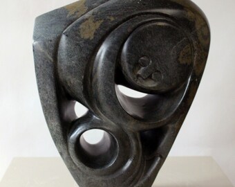 Mystery - A original, one of a kind Shona sculpture in Green Serpentine