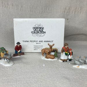 May include: A set of six hand-painted porcelain figurines depicting farm people and animals. The set includes a farmer with a cart full of hay, a woman with a child, a deer, a fawn, and two geese. The figurines are part of the Heritage Village Collection.