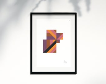 May include: A framed abstract geometric print with a black frame. The print features a colorful design with shades of orange, yellow, brown, and purple.