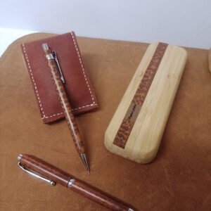 beautiful bespoke hand made snake wood pen and pencil set in matching case box