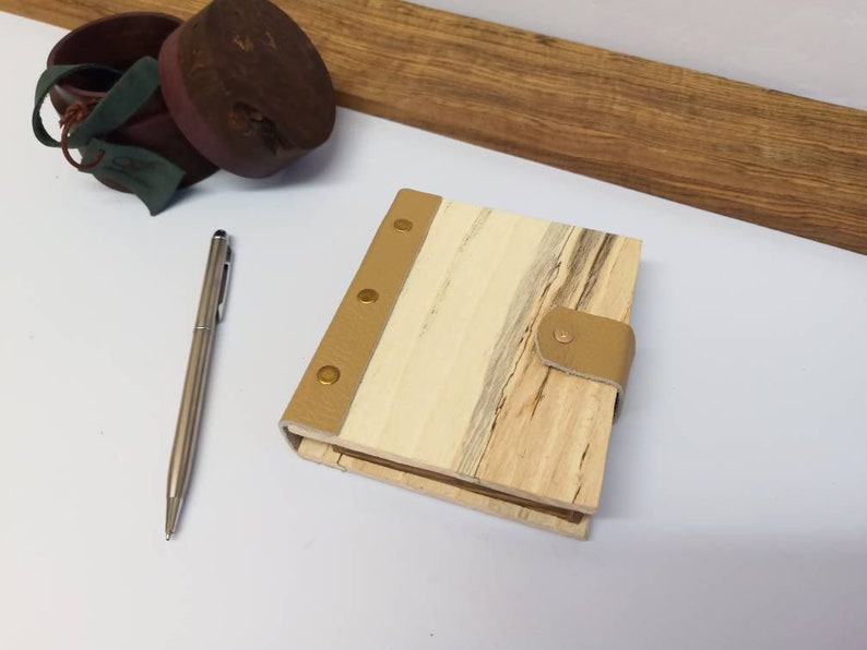 Beautiful hand made Wood leather book box with brass fastener. Beautiful hand made Wood leather book box with brass fastener.