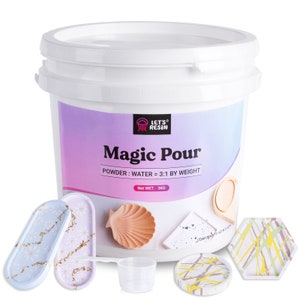 May include: A white bucket of Magic Pour resin powder with a pink and purple background. The label says "LET'S® RESIN Magic Pour POWDER: WATER = 3:1 BY WEIGHT Net WET: 3KG". The image also shows a variety of resin projects, including a seashell, a tray, and a coaster.