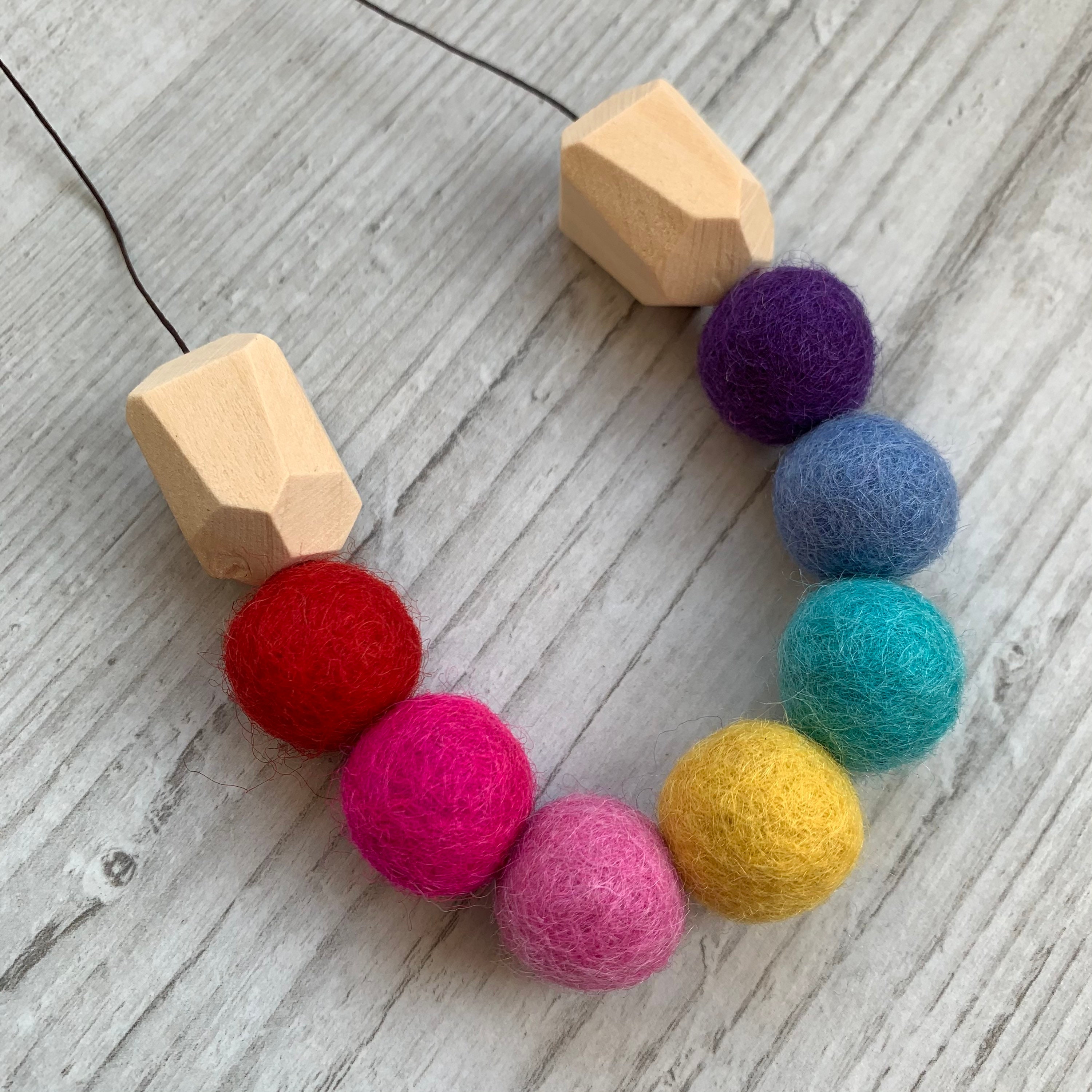 Felt ball necklace bright rainbow