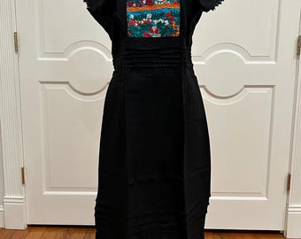 One of the kind Mexican embroidered dress, hand Embroidered with cotton threads.