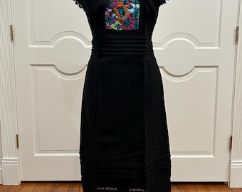 One of the kind Mexican embroidered dress, hand Embroidered with cotton threads.