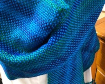 Hand woven scarf with multi color background