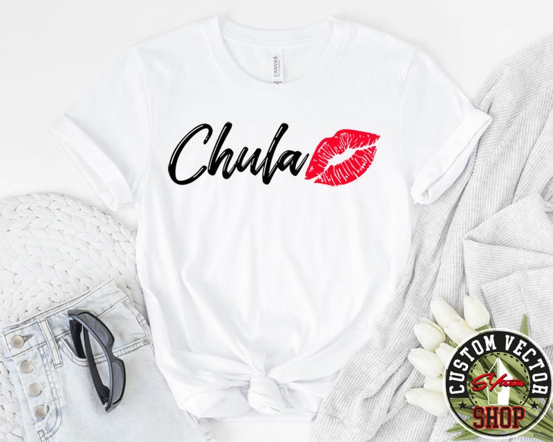May include: White t-shirt with black text that says "Chula" and a red lip print.