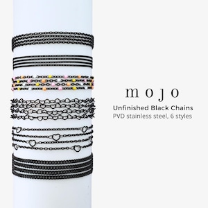 May include: Six styles of unfinished black PVD stainless steel chains displayed vertically. The collection includes plain link chains, a chain with colorful beads, heart-shaped link chains, and chains with interspersed heart charms. Text reads: mojo Unfinished Black Chains PVD stainless steel, 6 styles.