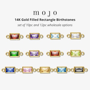 May include: Gold-filled rectangle birthstone charms in various colors, including red, purple, and blue. The charms are connected by small loops. The text "mojo" and "14K Gold Filled Rectangle Birthstones" are displayed.