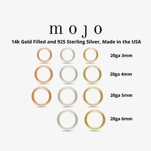 May include: An assortment of gold-filled and sterling silver jump rings in various sizes. The image displays rings in rose gold, silver, and gold, with sizes ranging from 3mm to 6mm. The text "mojo" is at the top, with details about the materials used.