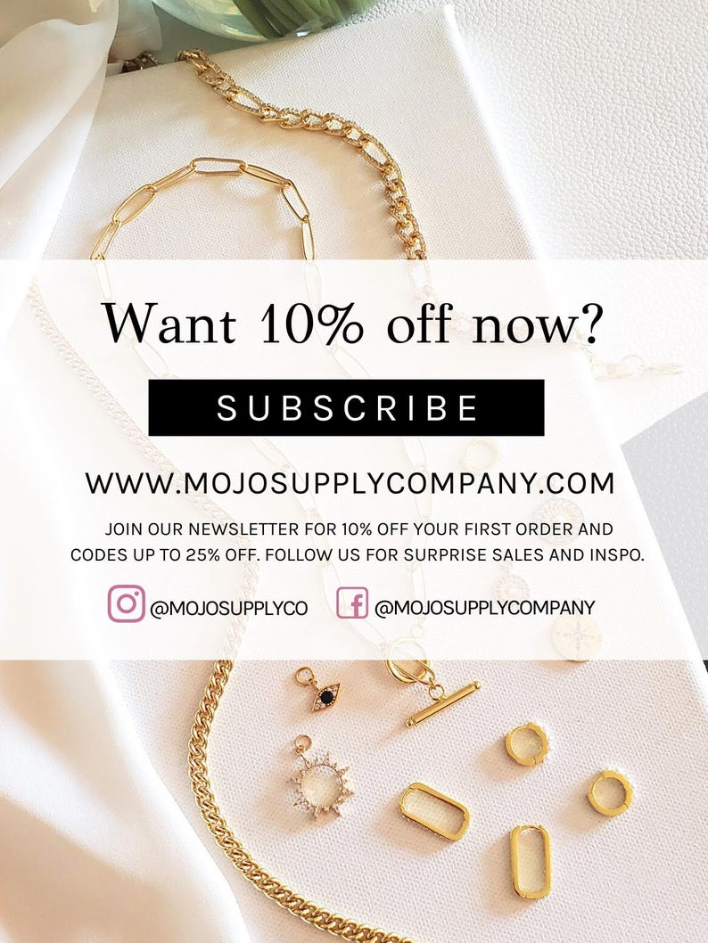 May include: Gold-toned jewelry pieces, including a chain, bracelet, and various charms and earrings, are displayed on a white surface. The image includes text that says "Want 10% off now? SUBSCRIBE". The website address is www.mojosupplycompany.com.