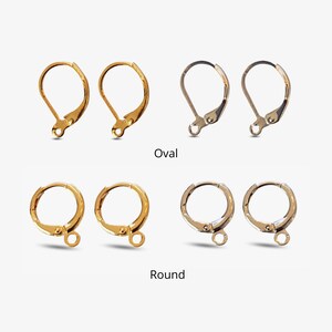 May include: Two pairs of gold earring findings, one pair with oval loops and one pair with round loops.
