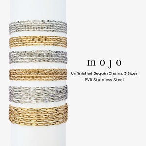 May include: A set of three ceramic mugs with a speckled, matte finish. The mugs are in shades of cream, light gray, and dark gray. Each mug has a simple, minimalist design and a rounded handle.