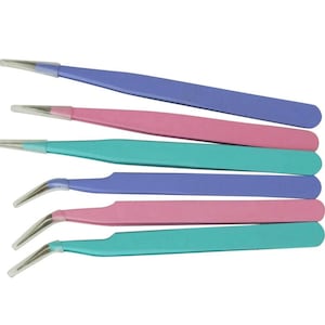 May include: A collection of colorful tweezers in shades of blue, pink, and teal. The tweezers have a sleek design with angled tips and protective covers. These precision tools are ideal for various tasks.