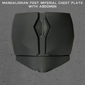May include: Black Mandalorian chest plate with a raised, diamond-shaped panel in the center. The chest plate has a rounded, pointed bottom.