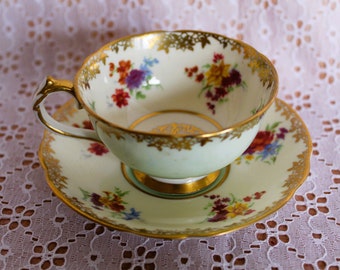 Exquisite Paragon Ivory and Light Blue Demi Cup and Saucer - Excellent Condition - Fine Bone China