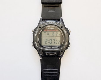 Zabytkowy zegarek cyfrowy Casio W-94H Illuminator 36 mm z automatycznym podświetleniem, modyfikacja z 1950 r. – DZIAŁA