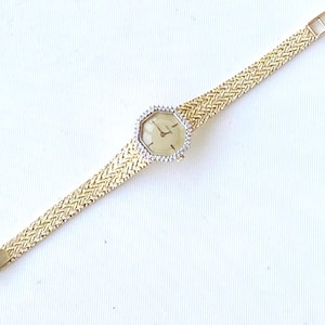 Vintage Geneva 14k yellow gold diamond case 14k yellow gold braided bracelet watch, 21mm case, quartz movement, running