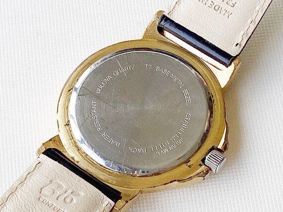 Bulova quartz t7 base metal bezel stainless steel back deals