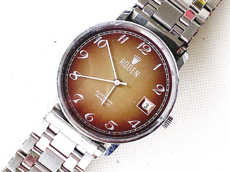 vintage rogen incabloc men's automatic watch, 33mm case, running with signs of aging image 1