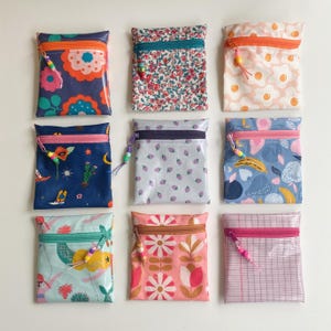 Wetbag mini | Geldbörse | 10 x 11 cm | Wachstuch beschichtete Baumwolle | Reissverschluss | Kleine Tasche Binden Tampons abwischbar