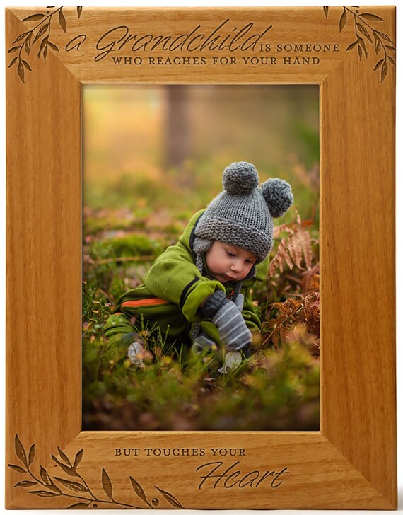 thumbnail image 2 of A Grandchild Is Someone Who Reaches For Your Hand But Touches Your... 2 of 12