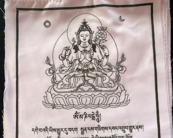 May include: White prayer flag with a black and white illustration of a deity sitting in a lotus position. The flag has Tibetan text that reads "ཨོཾ་མ་ཎི་པདྨེ་ཧཱུྃ།" and "དགེ་བ་འདི་ཡིས་མྱུར་དུ་བདག སྤྱན་རས་གཟིགས་དབང་འགྲུབ་གྱུར་ནས། འགྲོ་བ་གཅིག་ཀྱང་མ་ལུས་པ། དེ་ཡི་ས་ལ་འགོད་པར་ཤོག".