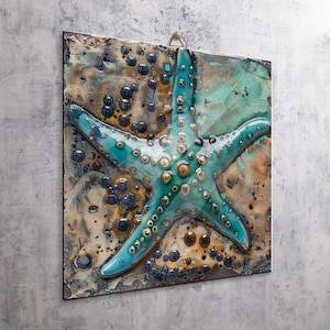 May include: A square wall plaque featuring a raised, glossy turquoise starfish at the centre. The background has a textured, multi-coloured finish with shades of tan, brown, and dark blue, accented by numerous small, raised circular bubbles.