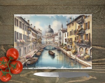 May include: A watercolor painting of a canal in Venice, Italy. The canal is lined with colorful buildings and a bridge crosses the water. There are gondolas in the water.