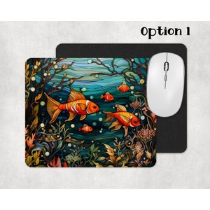 May include: A colourful mouse mat with an underwater scene featuring orange and white fish swimming among green and blue seaweed. The mouse mat has a black border.