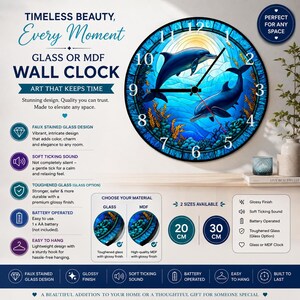 May include: A round wall clock featuring a faux stained glass design of two dolphins swimming in a blue ocean with coral and seaweed. The clock face has black numbers from 1 to 12 and black hands. Text includes TIMELESS BEAUTY, Every Moment, GLASS OR MDF WALL CLOCK, ART THAT KEEPS TIME, and 20 CM or 30 CM size options.