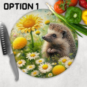 May include: A round chopping board featuring a colourful illustration of a hedgehog surrounded by daisies and sunflowers. The hedgehog is brown with a white belly. The daisies are white with yellow centres. The sunflowers are yellow with brown centres. The chopping board is made of wood and has a natural finish.