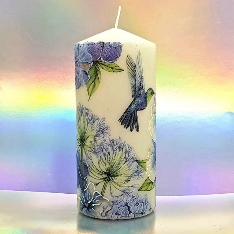 Decorative pillar candle with floral design and