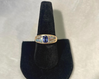 A Fantastic White and Yellow 18k Gold Opal Diamond and Emerald Ring