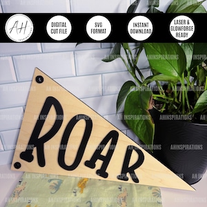 May include: A wooden pennant sign featuring the word "ROAR" in bold black lettering. The triangular sign has a light wood grain finish. It is designed for laser cutting and is available for instant download.
