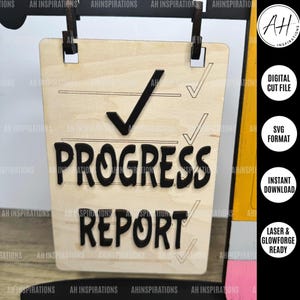 May include: A wooden sign with the text "PROGRESS REPORT" in black lettering. The sign has a tick and lines for a checklist. The sign is designed for laser cutting and is available as a digital download.