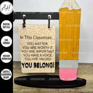 May include: Wooden classroom sign with the text "In This Classroom... You Matter, You Are Worth It, You Are Important, You Have a Voice, You Are Valued, You Belong!" A large yellow pencil with a pink eraser is next to the sign.
