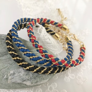 Pulseira Kumihimo preta e dourada com fios de ouro torcidos em seda Toray/fabricada no JAPÃO