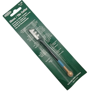 May include: A glass and tile cutter tool, packaged on a green and white card. The tool has a black handle with a blue and gold accent, and a silver cutting wheel. The packaging includes the text "Glass / Tile Cutter".
