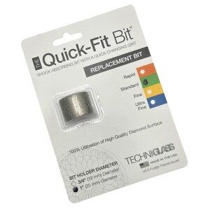 May include: A replacement Quick-Fit Bit for glass work, packaged on a white card. The card features the product name, a color-coded grit guide, and diameter sizes of 3/4 inch (19 mm) and 1 inch (25 mm). The bit is a cylindrical shape.